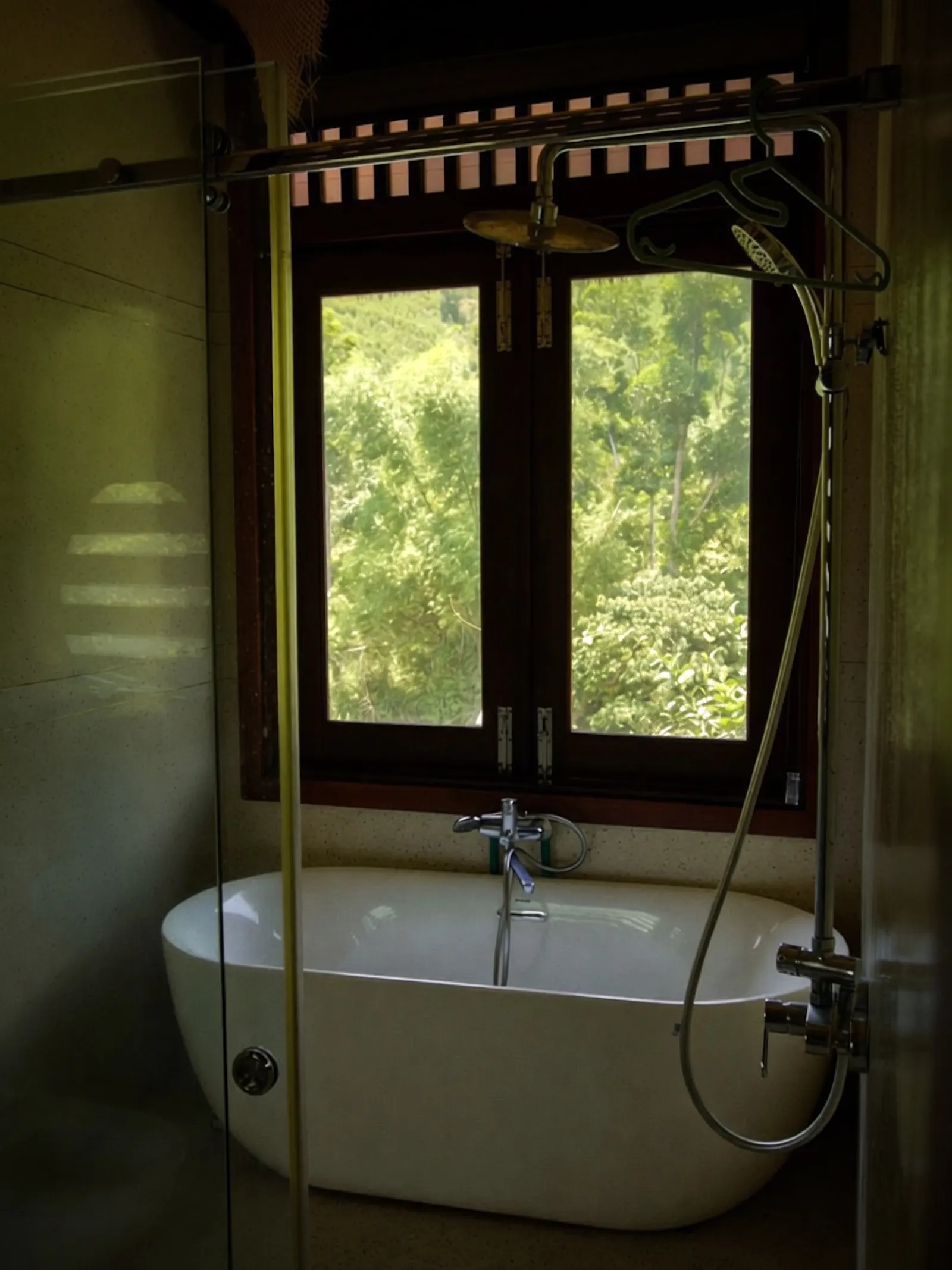 Open-air bath with jungle view